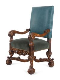 A Henri II Style Carved Walnut Armchair with Green Leather and Mohair Upholstery