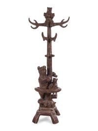 A Black Forest Style Patinated Metal Hall Tree