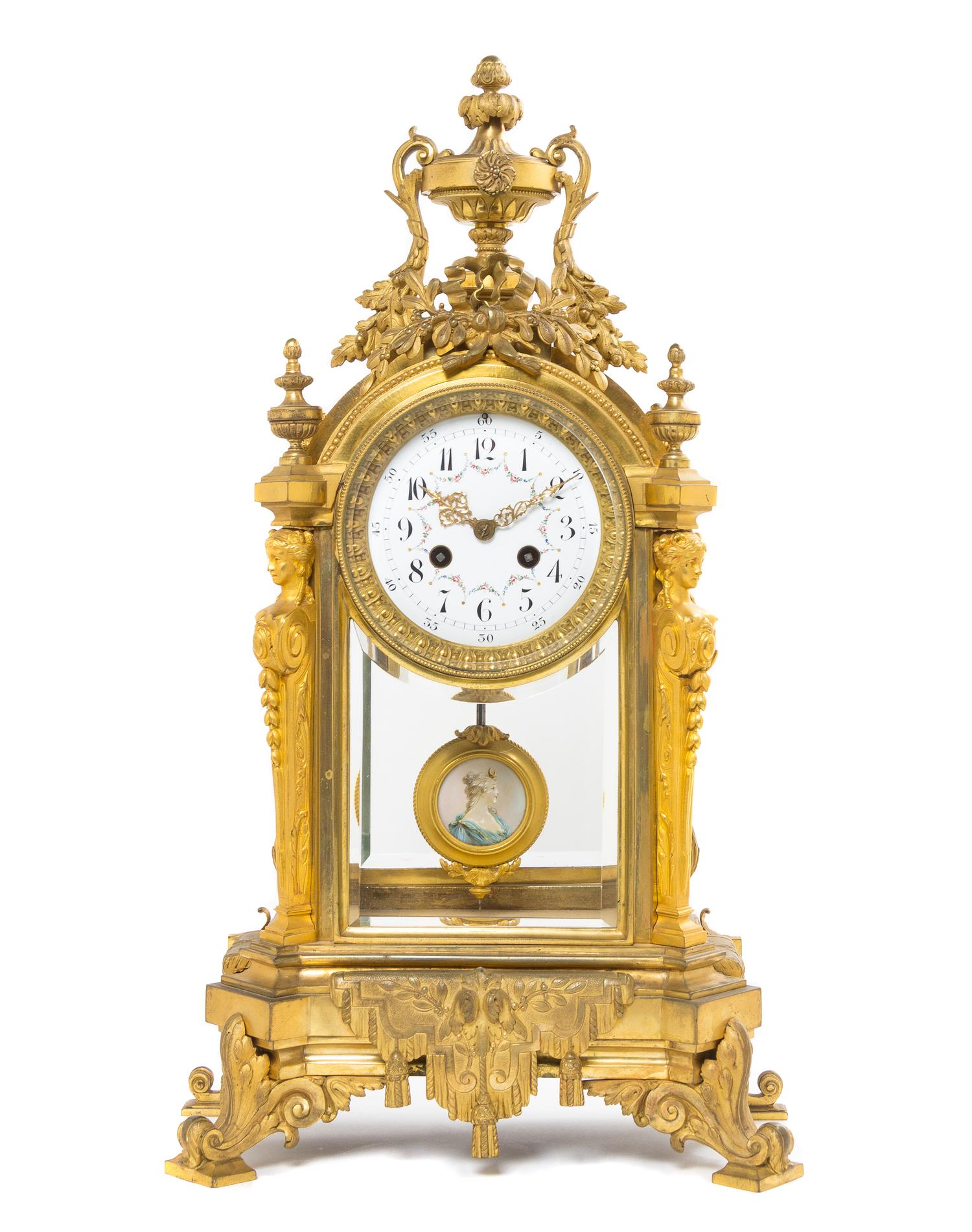 A Louis XVI Style Gilt Bronze Mantel Clock, Height 21 inches.