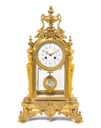 A Louis XVI Style Gilt Bronze Mantel Clock, Height 21 inches.