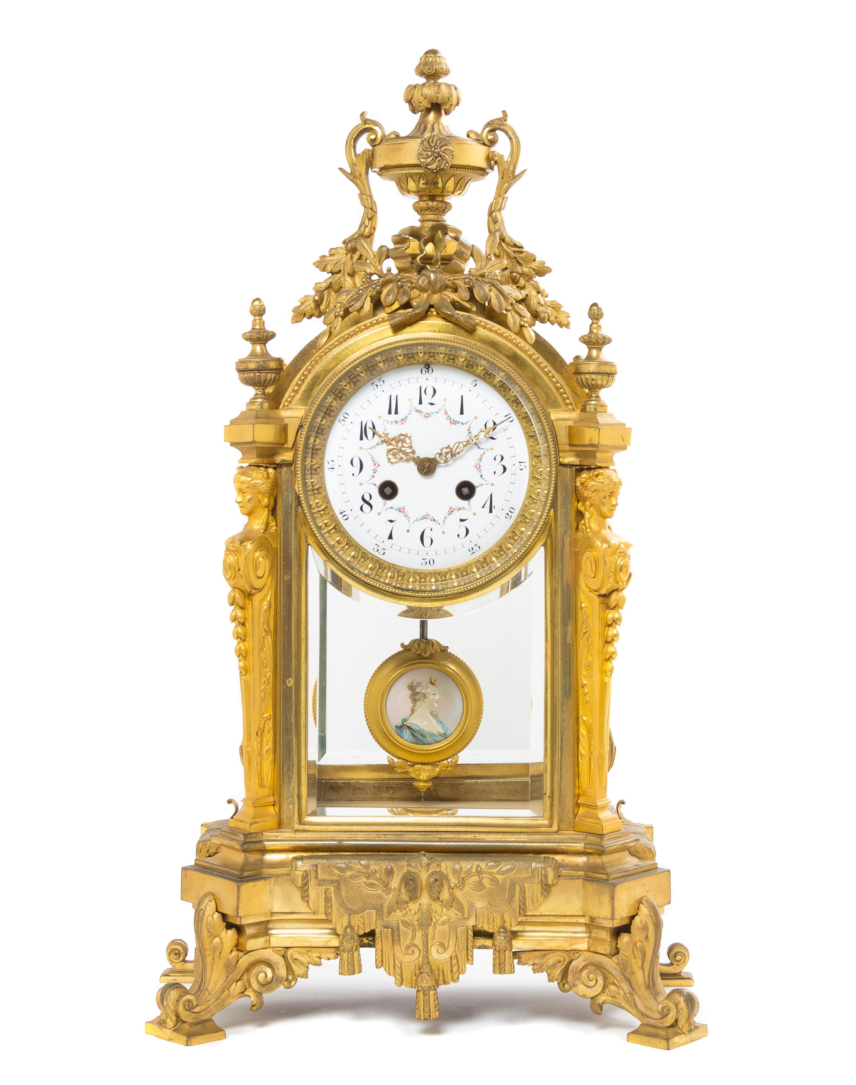 A Louis XVI Style Gilt Bronze Mantel Clock, Height 21 inches.