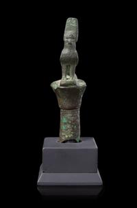 An Egyptian Bronze Horus Finial Height 4 1/4 inches. — LATE PERIOD TO PTOLEMAIC PERIOD, 664-30 B.C.E.