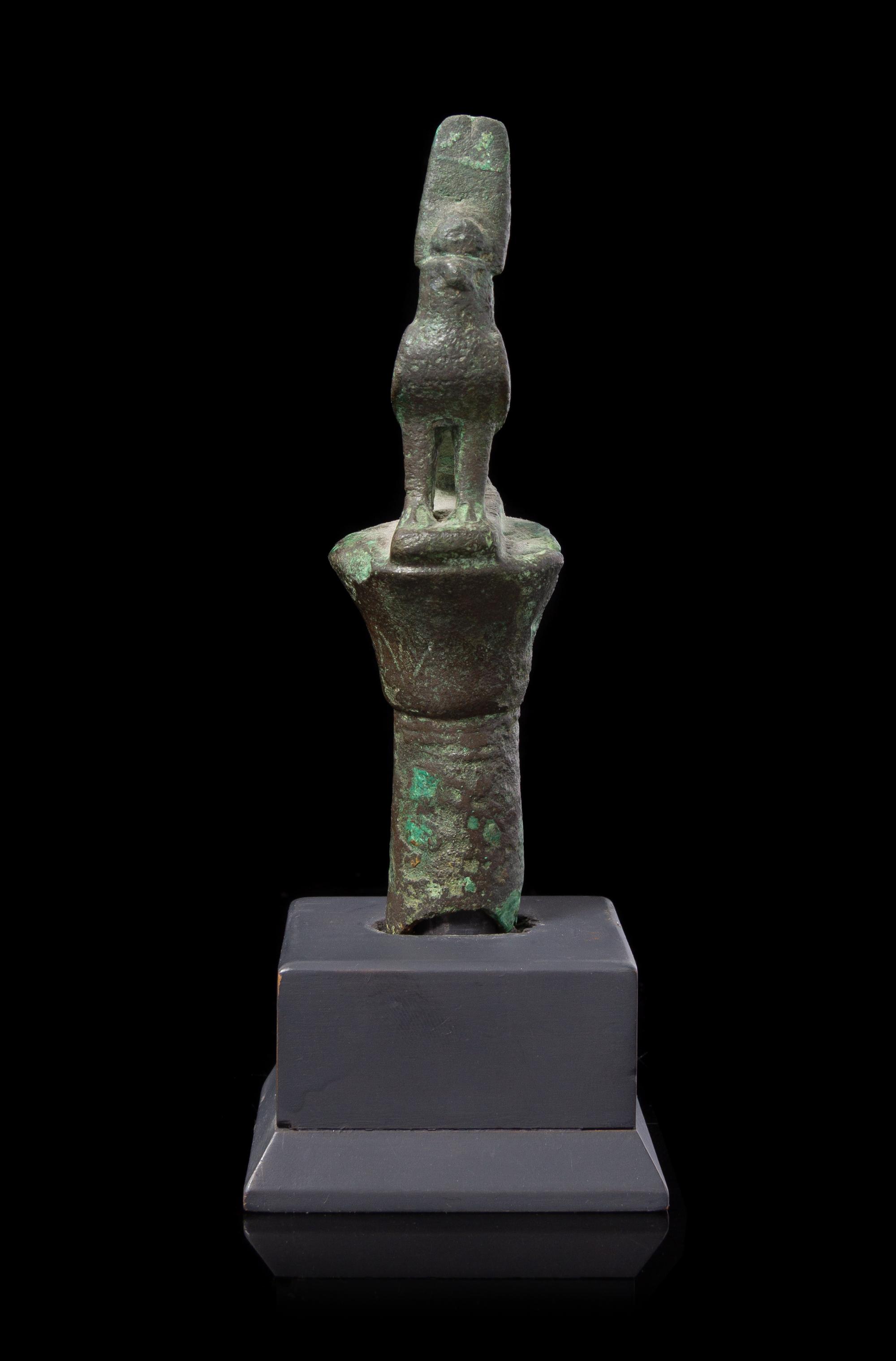 An Egyptian Bronze Horus Finial Height 4 1/4 inches. — LATE PERIOD TO PTOLEMAIC PERIOD, 664-30 B.C.E.