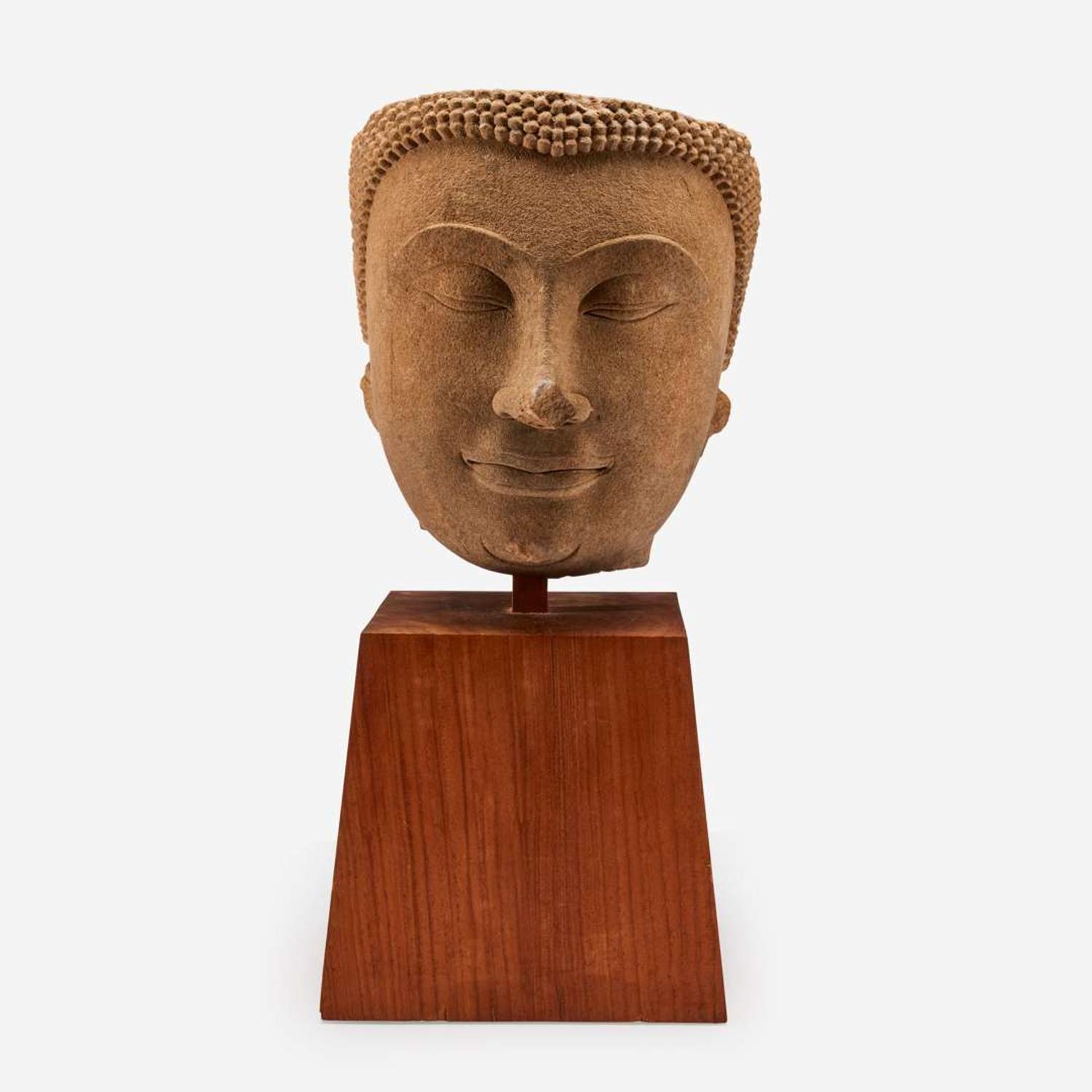 A large Thai carved sandstone head of a Buddha泰国石雕佛首