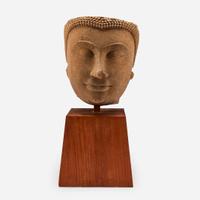 A large Thai carved sandstone head of a Buddha泰国石雕佛首
