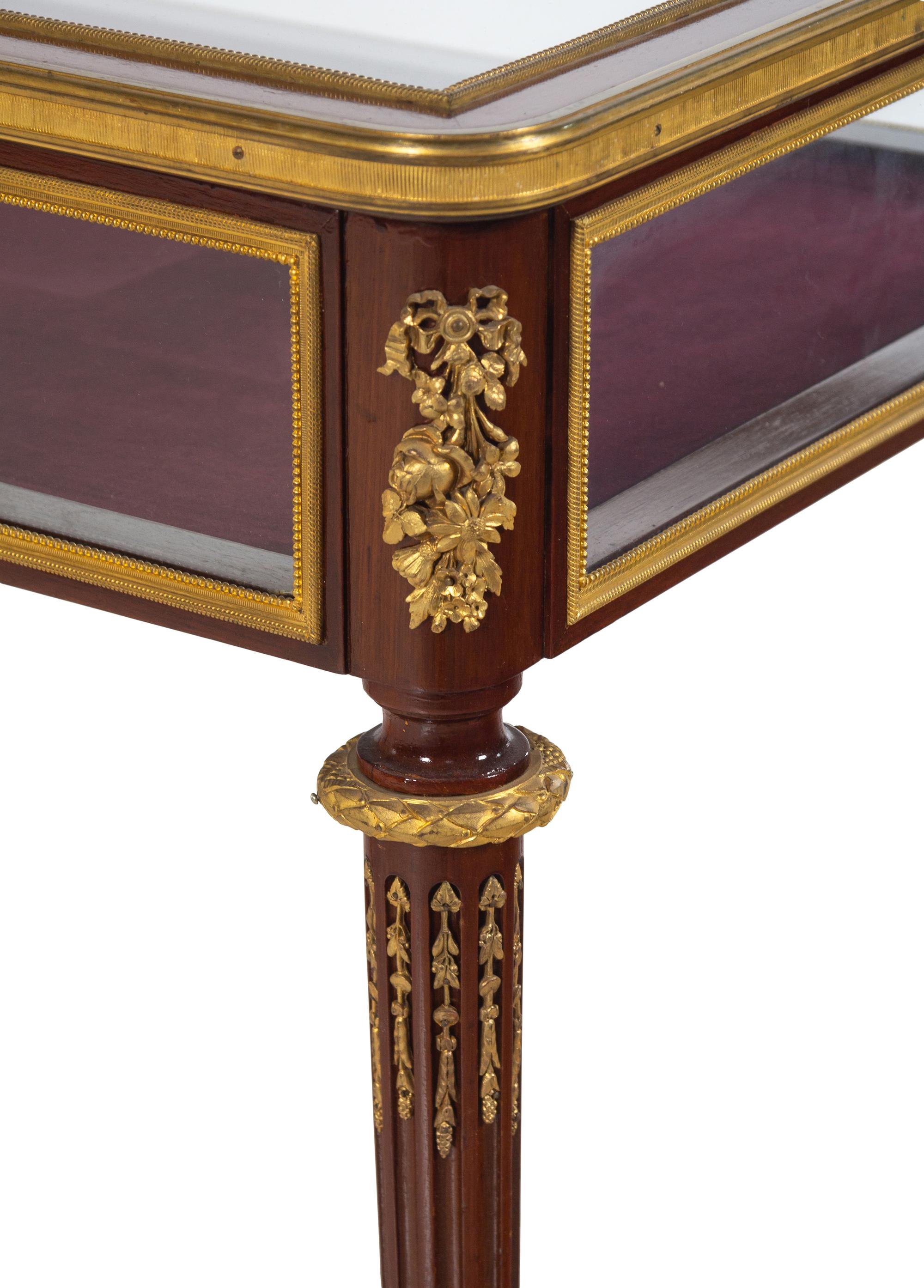 A Louis XVI Style Gilt Bronze Mounted Vitrine Table