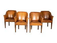 A Set of Four Leather-Upholstered Barrel-Back Armchairs