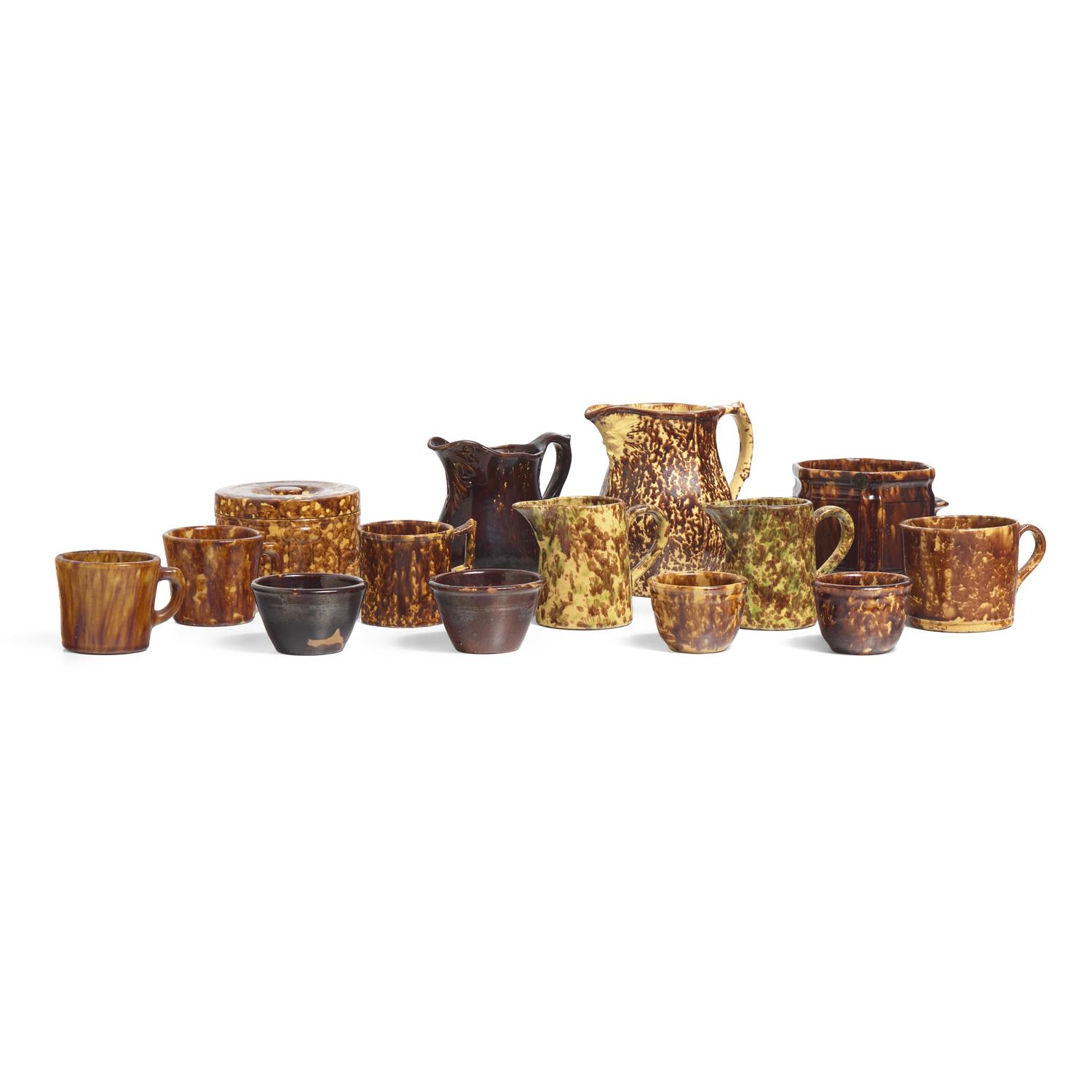 A Group of Fourteen Bennington or Rockingham Glazed Earthenware Items