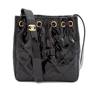 A Chanel Black Patent Leather Quilted Drawstring Bag, 7" x 7.25" x 3.25"; Strap drop: 18".