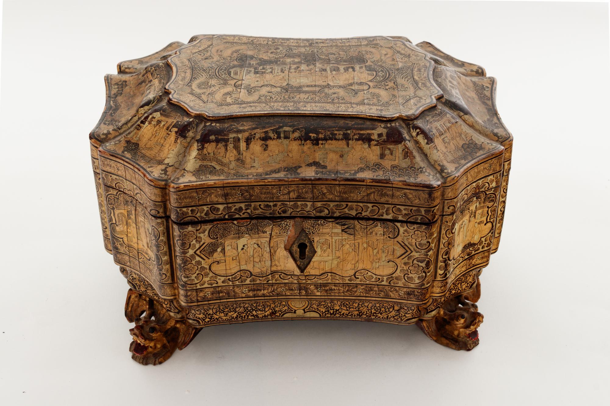 A Chinese Export Gilt Decorated Black Lacquer Tea Caddy
