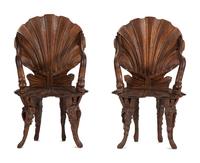 A Pair of Venetian Shell-and-Dolphin Carved Walnut Grotto Armchairs