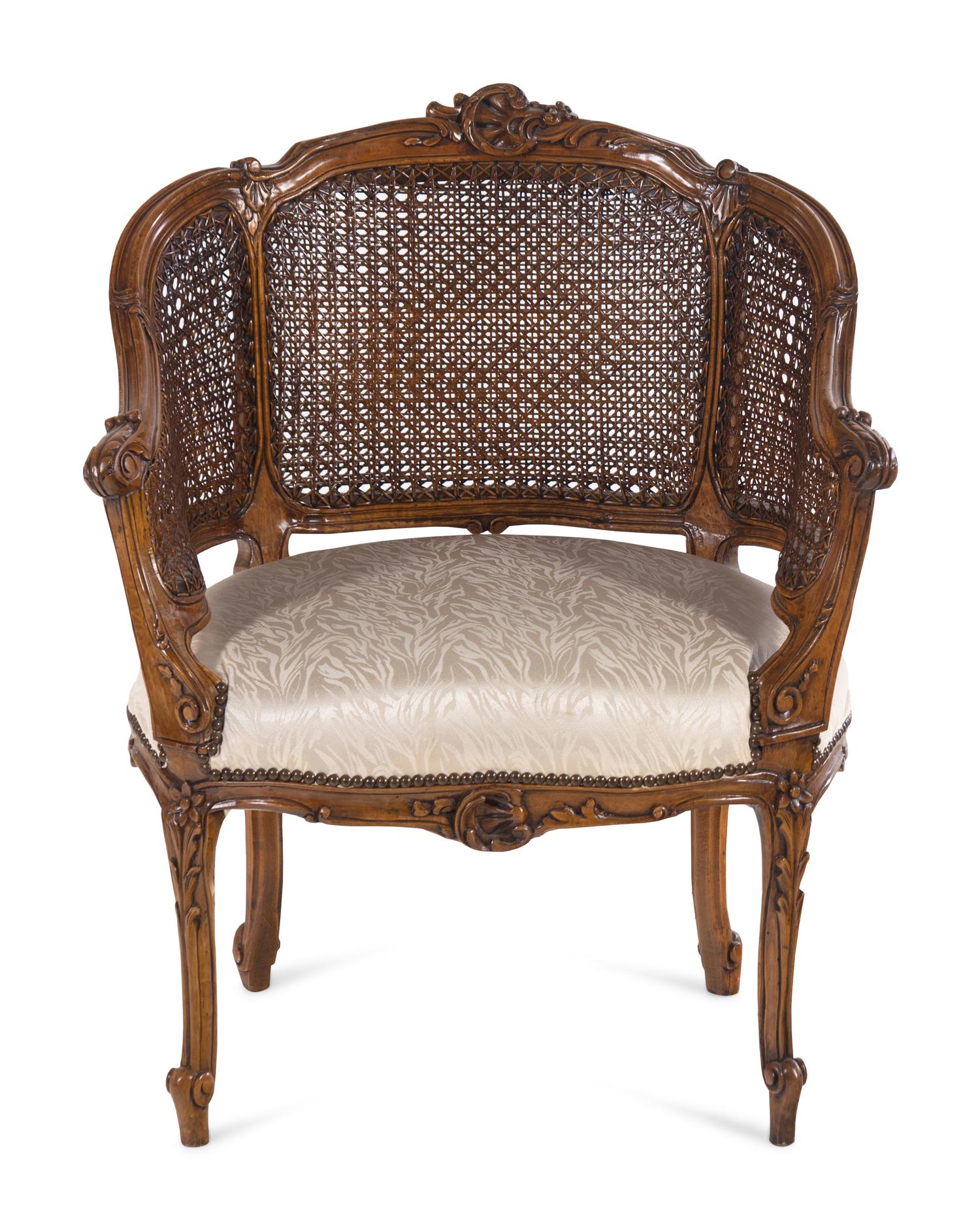 A Louis XV Style Beechwood Caned Bergère