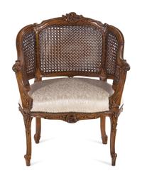 A Louis XV Style Beechwood Caned Bergère