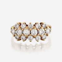A diamond and fourteen karat gold ring