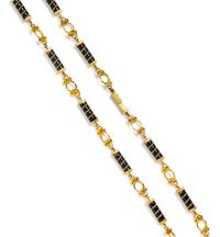 A Yellow Gold and Onyx Longchain Necklace, 60.50 dwts.