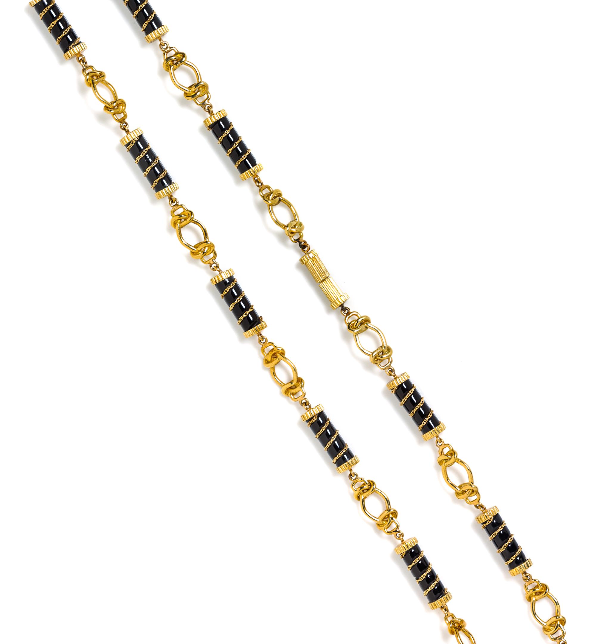 A Yellow Gold and Onyx Longchain Necklace, 60.50 dwts.