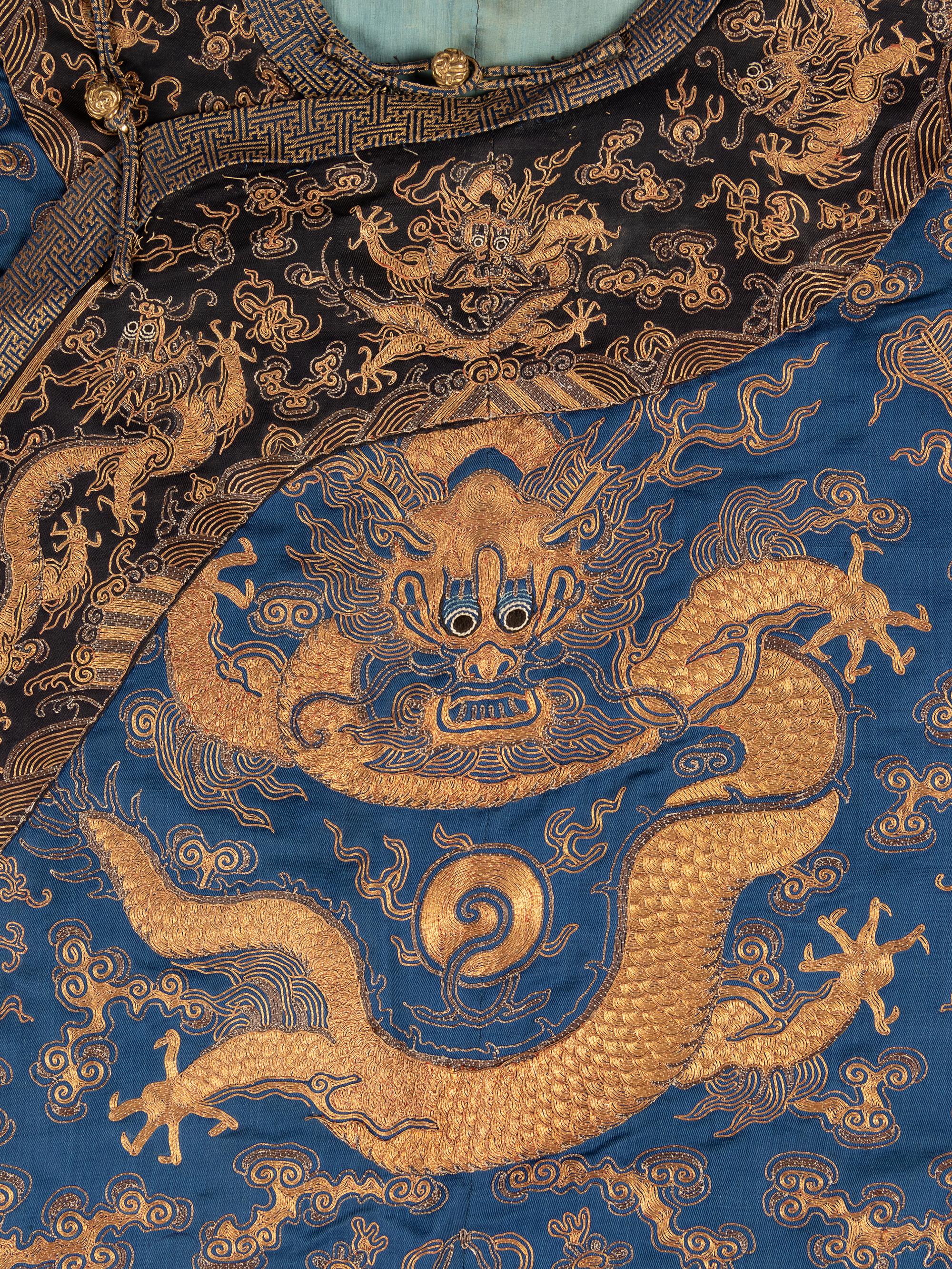 A Blue Ground Embroidered Silk Dragon Robe