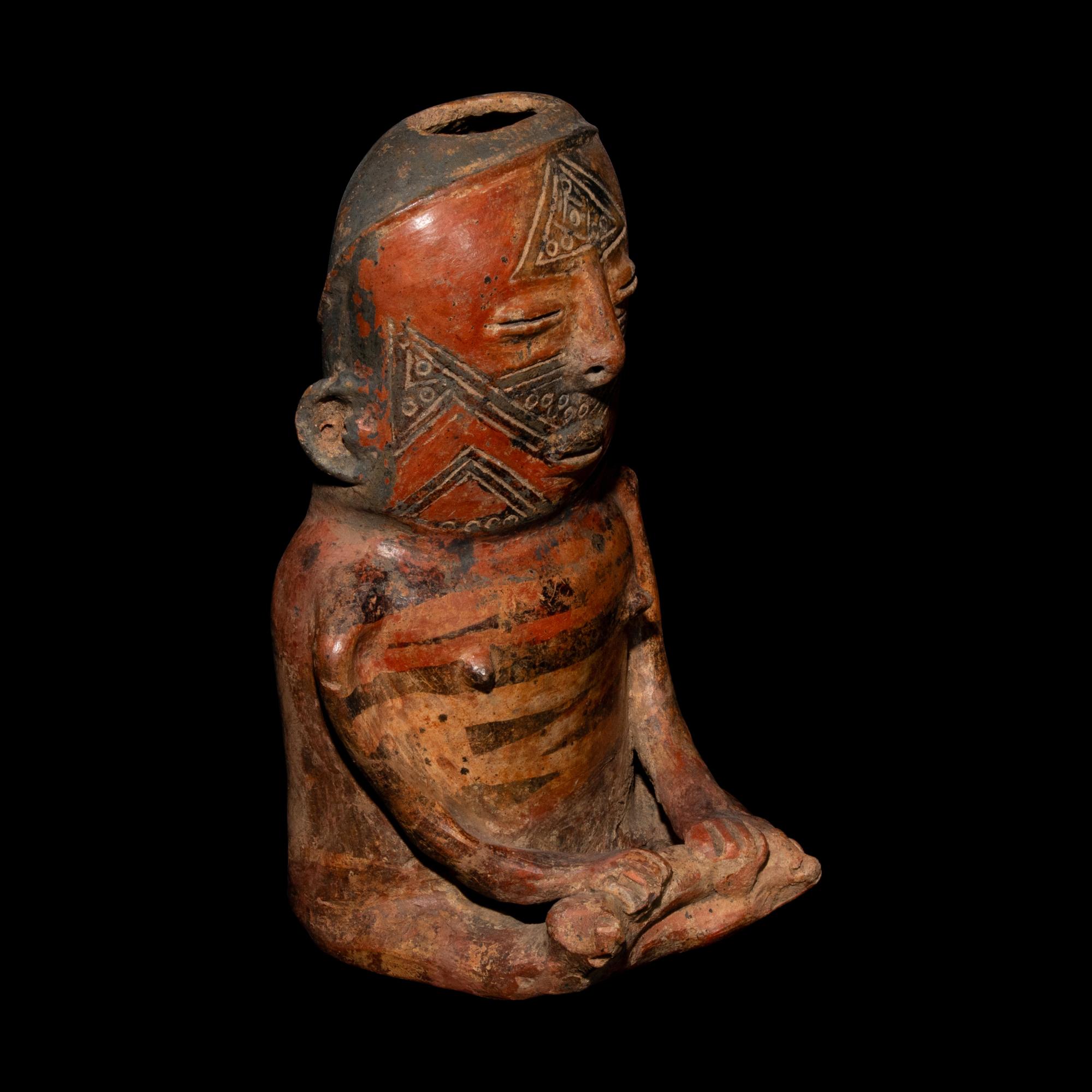 A Cauca Funerary Vessel in the Form of a Seated Thinker (Pensador)