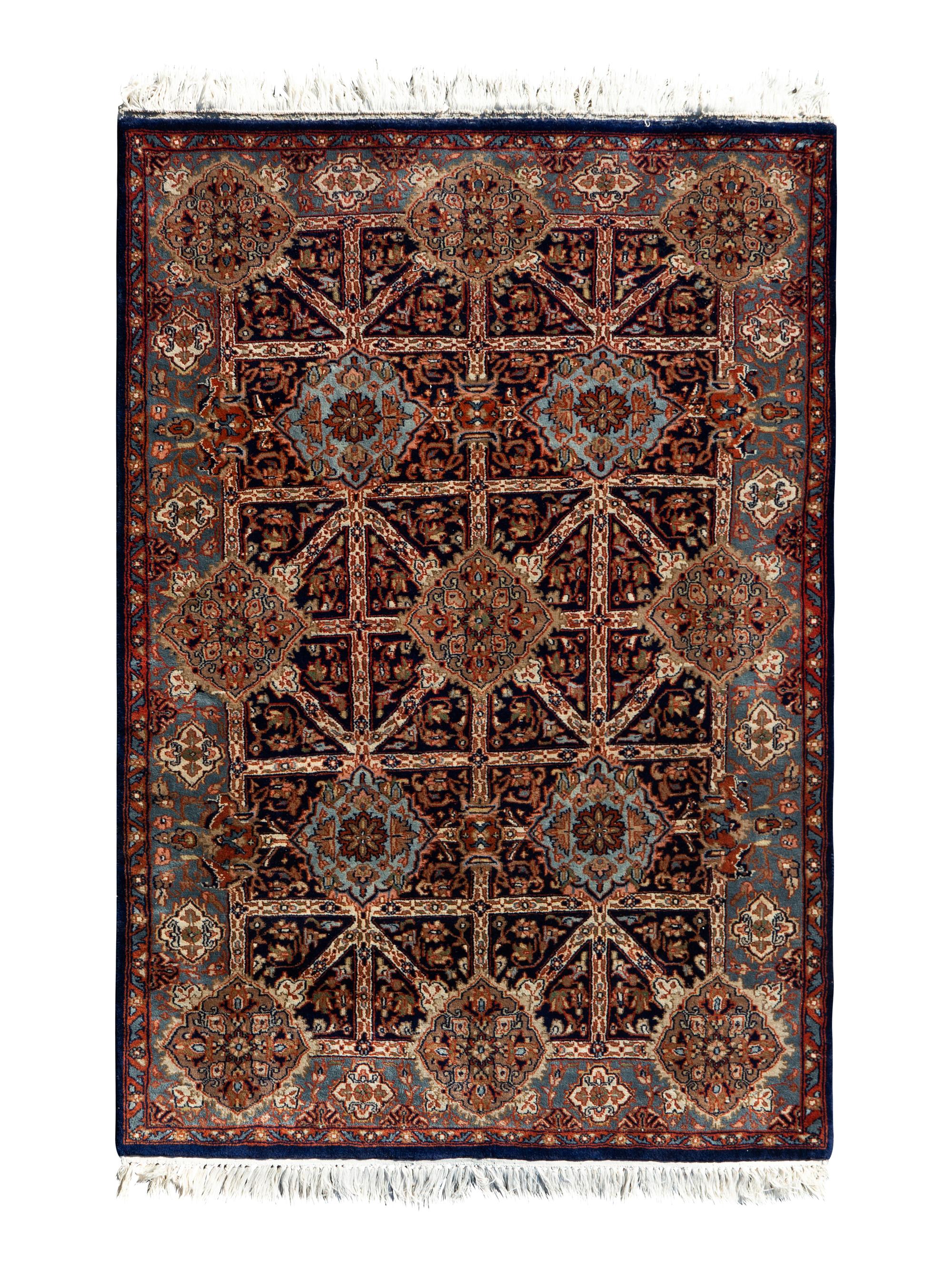 An Indo-Persian Wool Rug — 20TH CENTURY