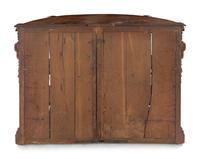 A Continental Carved Oak Demilune Cabinet
