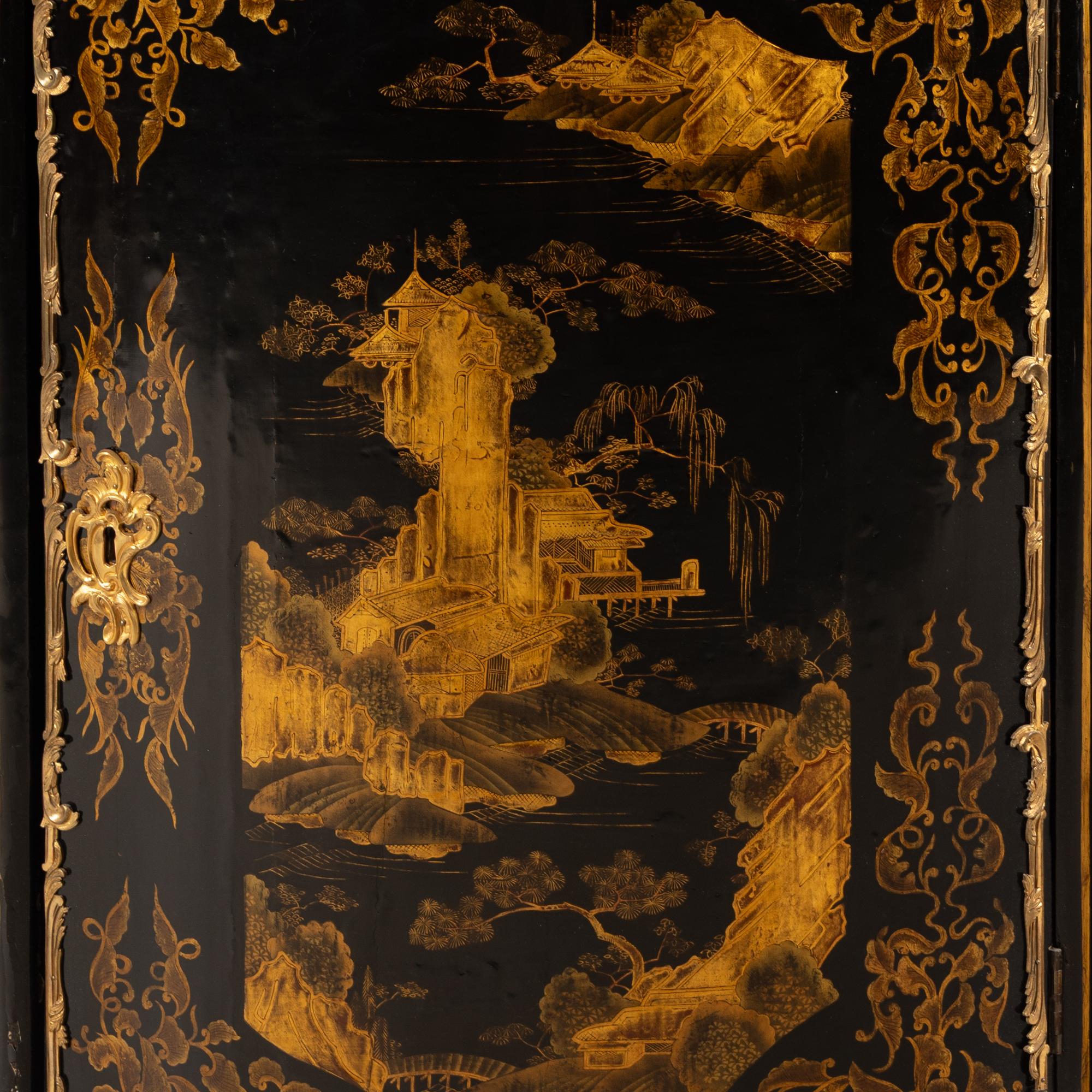 A Pair of Louis XV Chinese and European Lacquer and Gilt Bronze Mounted Encoignures