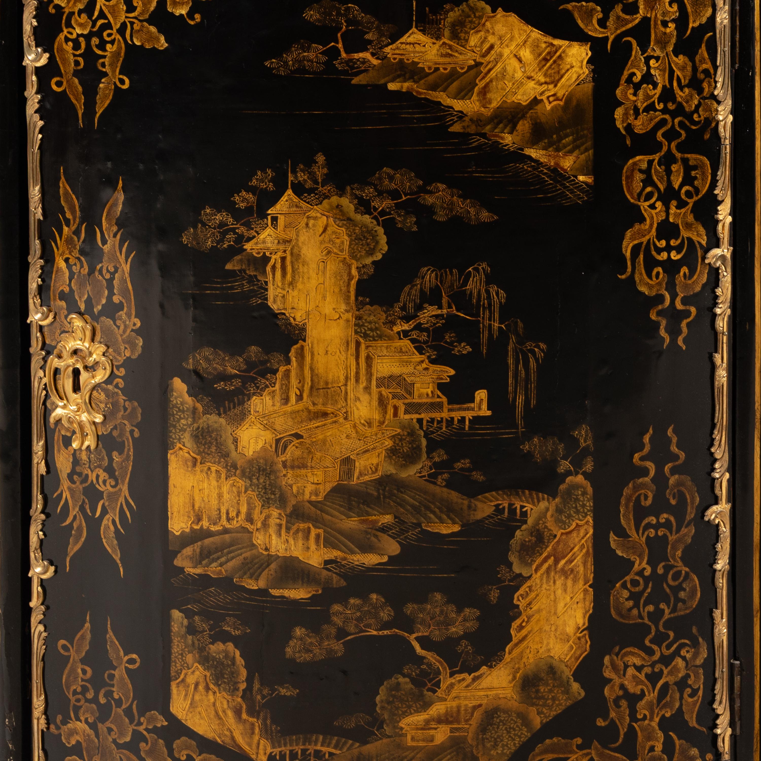 A Pair of Louis XV Chinese and European Lacquer and Gilt Bronze Mounted Encoignures