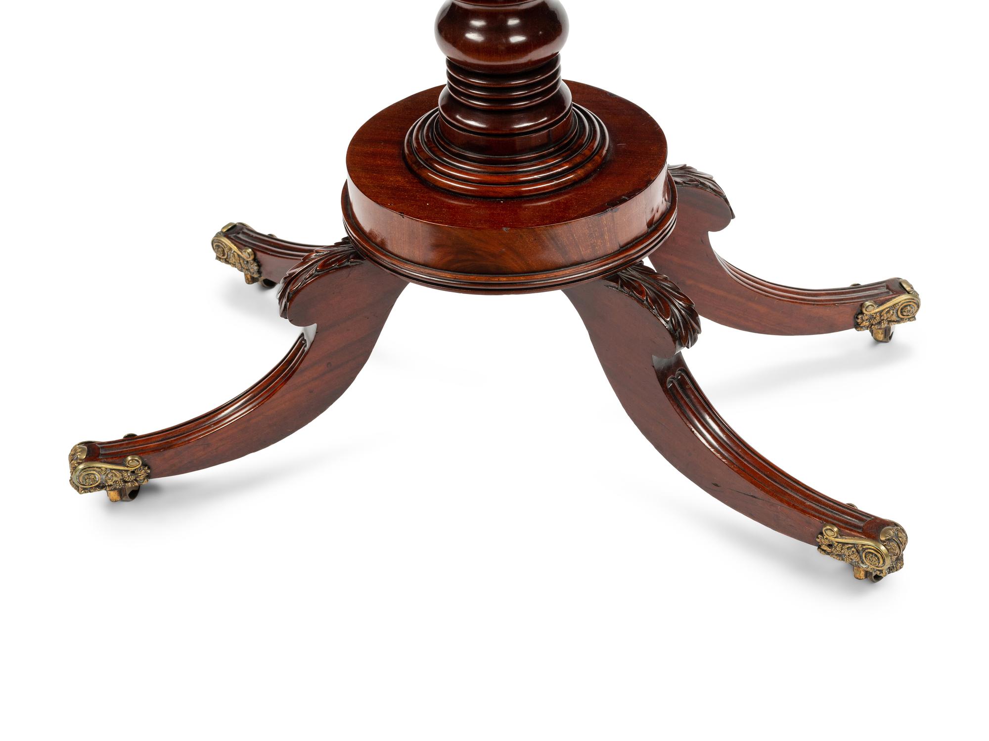 A Regency Crossbanded Mahogany Flip-Top Table