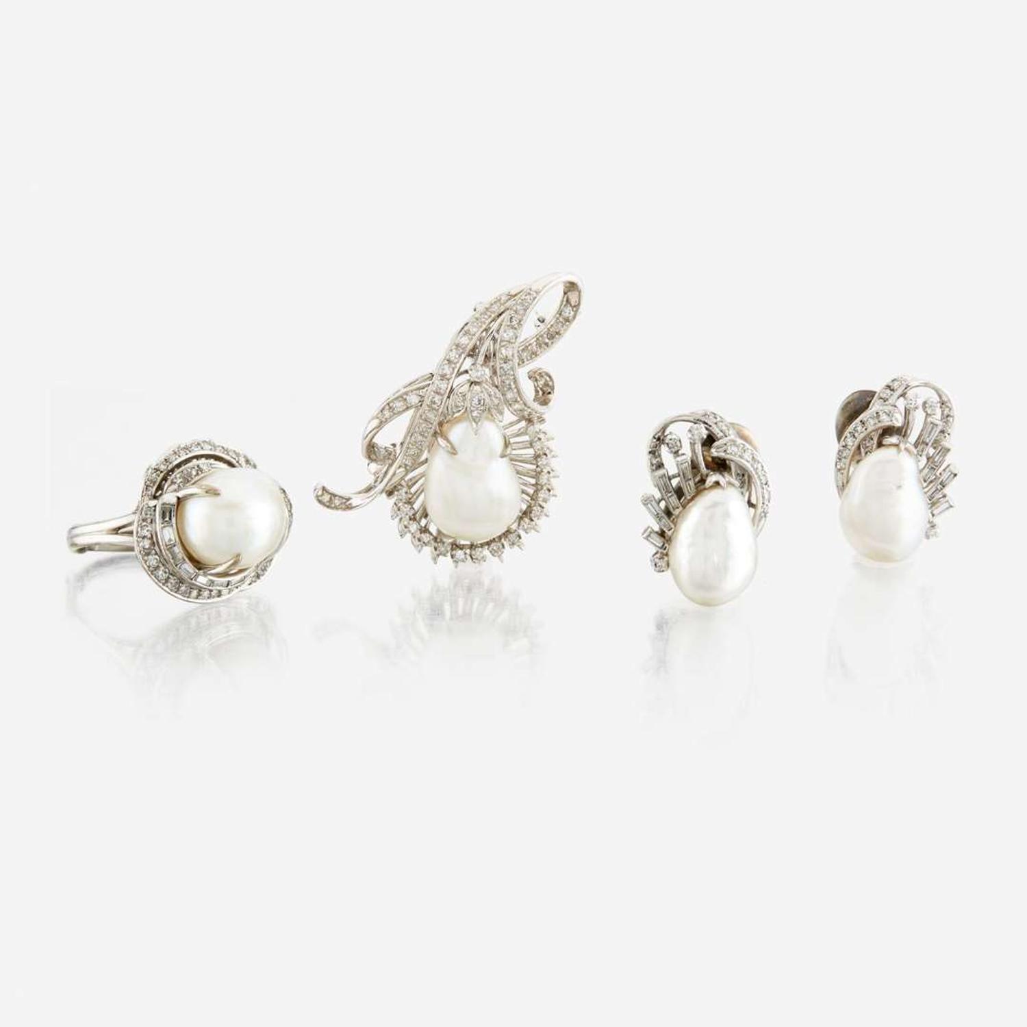 A suite of white gold, cultured pearl, and diamond jewelry