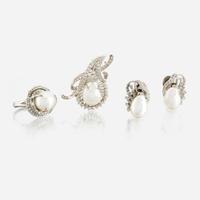 A suite of white gold, cultured pearl, and diamond jewelry