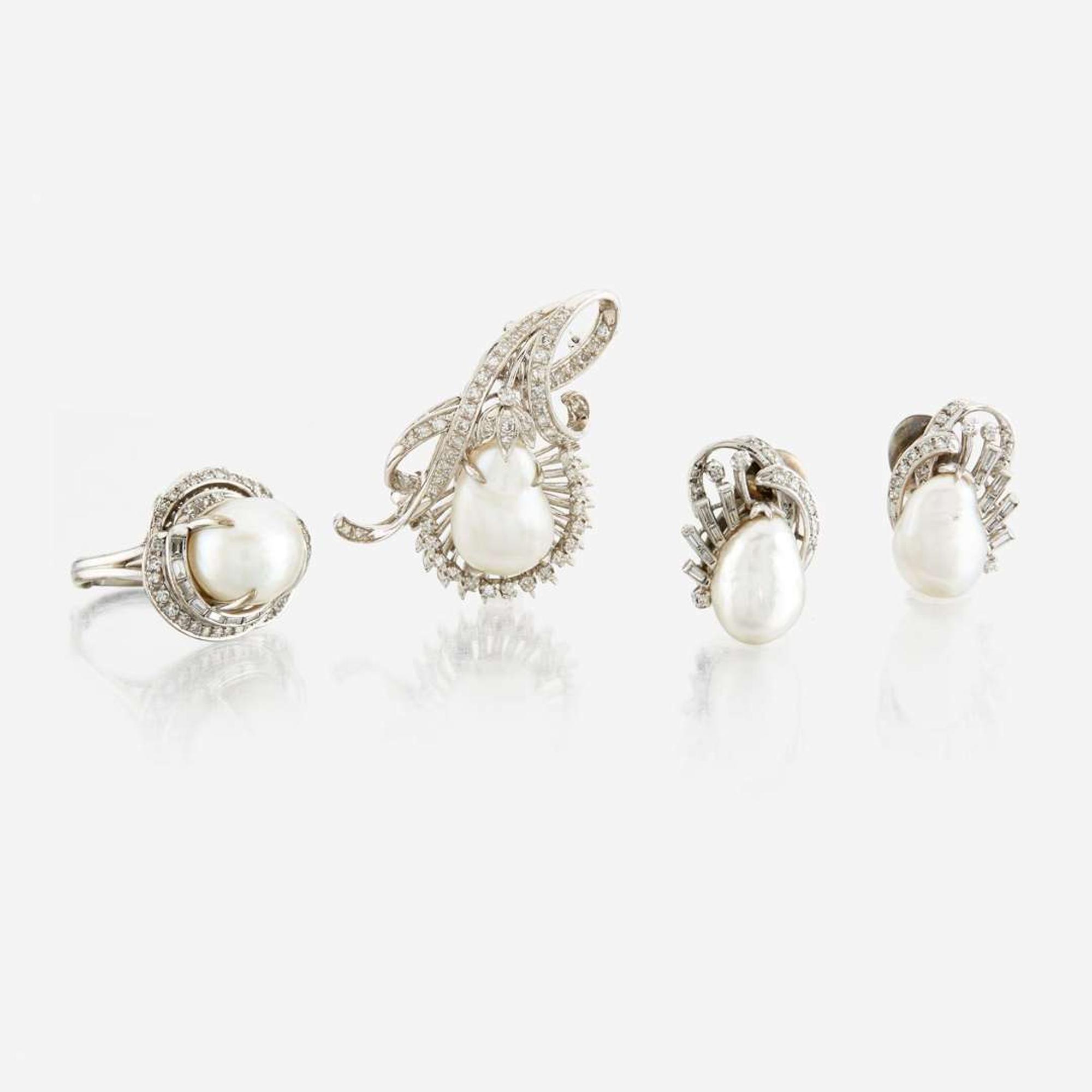 A suite of white gold, cultured pearl, and diamond jewelry