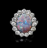 A Platinum, Diamond and Opal Ring, 5.90 dwts.