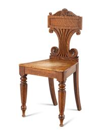 A Pair of William IV Carved Oak Hall Chairs