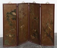 A Chinese Lacquered Four-Panel Screen Height 50 x width of each panel 15 3/4 inches.