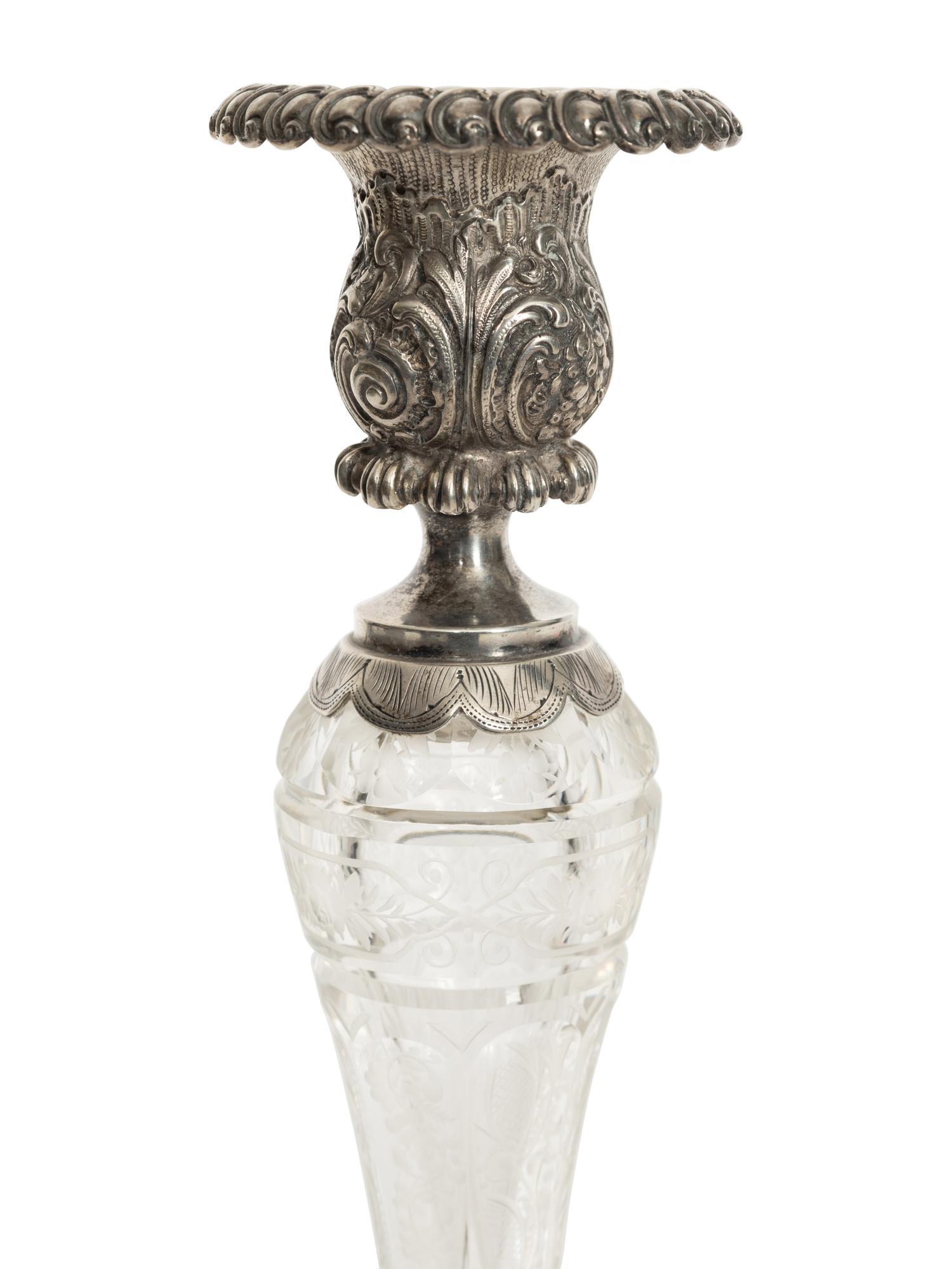 A Pair of German Silver and Cut Glass Figural Candlesticks