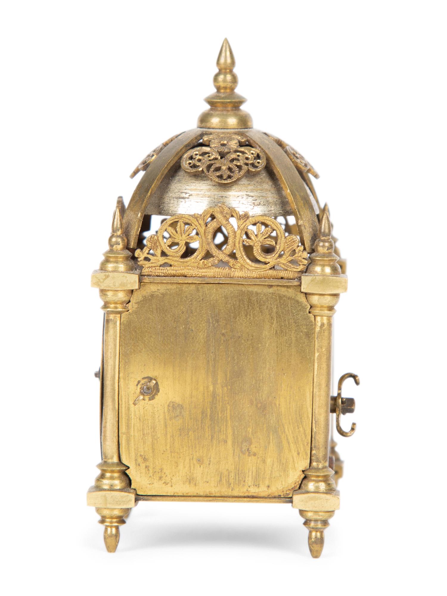 An English Brass Lantern Clock and A Sundial/Compass