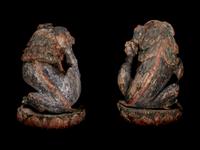 A Pair of Chinese Polychrome Painted Wood Figures of Fu Lions