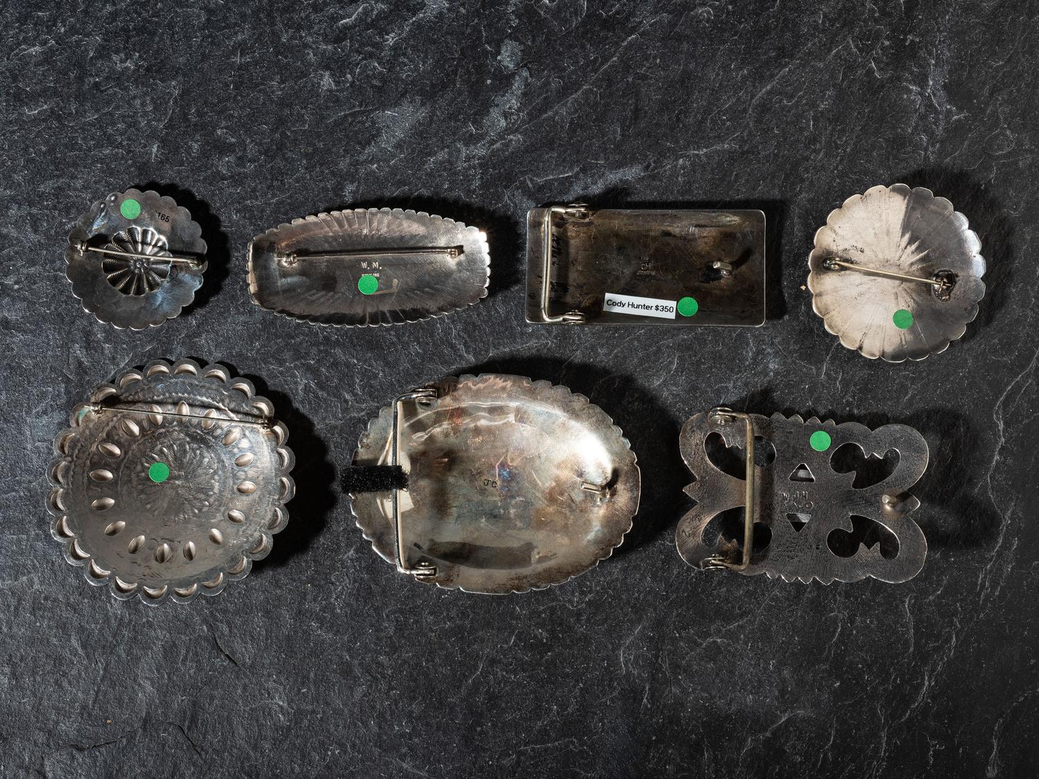 Assortment of Navajo Belt Buckles and Pins