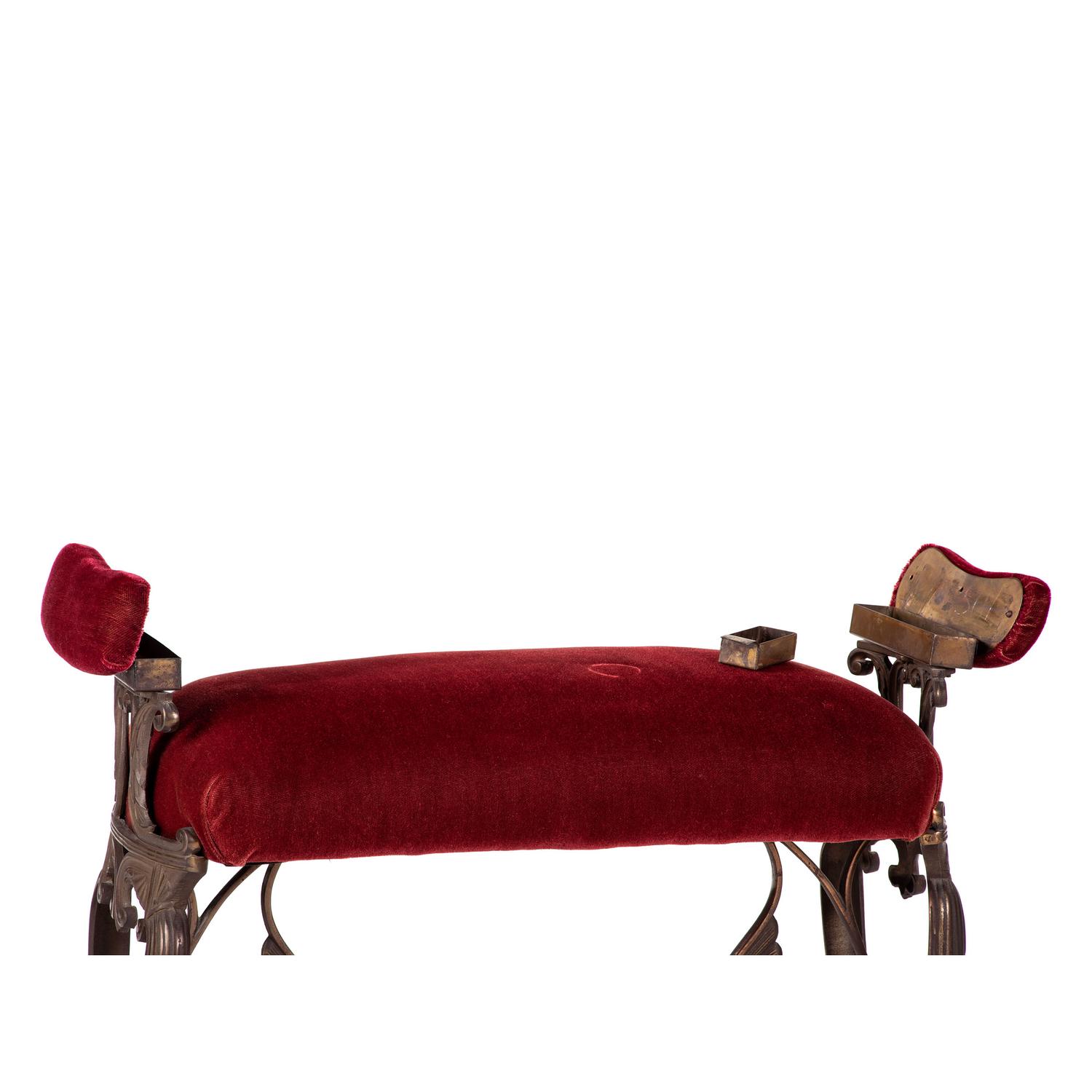 A Cast Iron and Velvet Smoking Bench