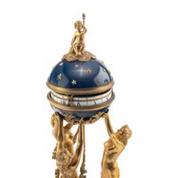 A Louis XVI Style Gilt-Bronze and White Marble Annular Clock Garniture