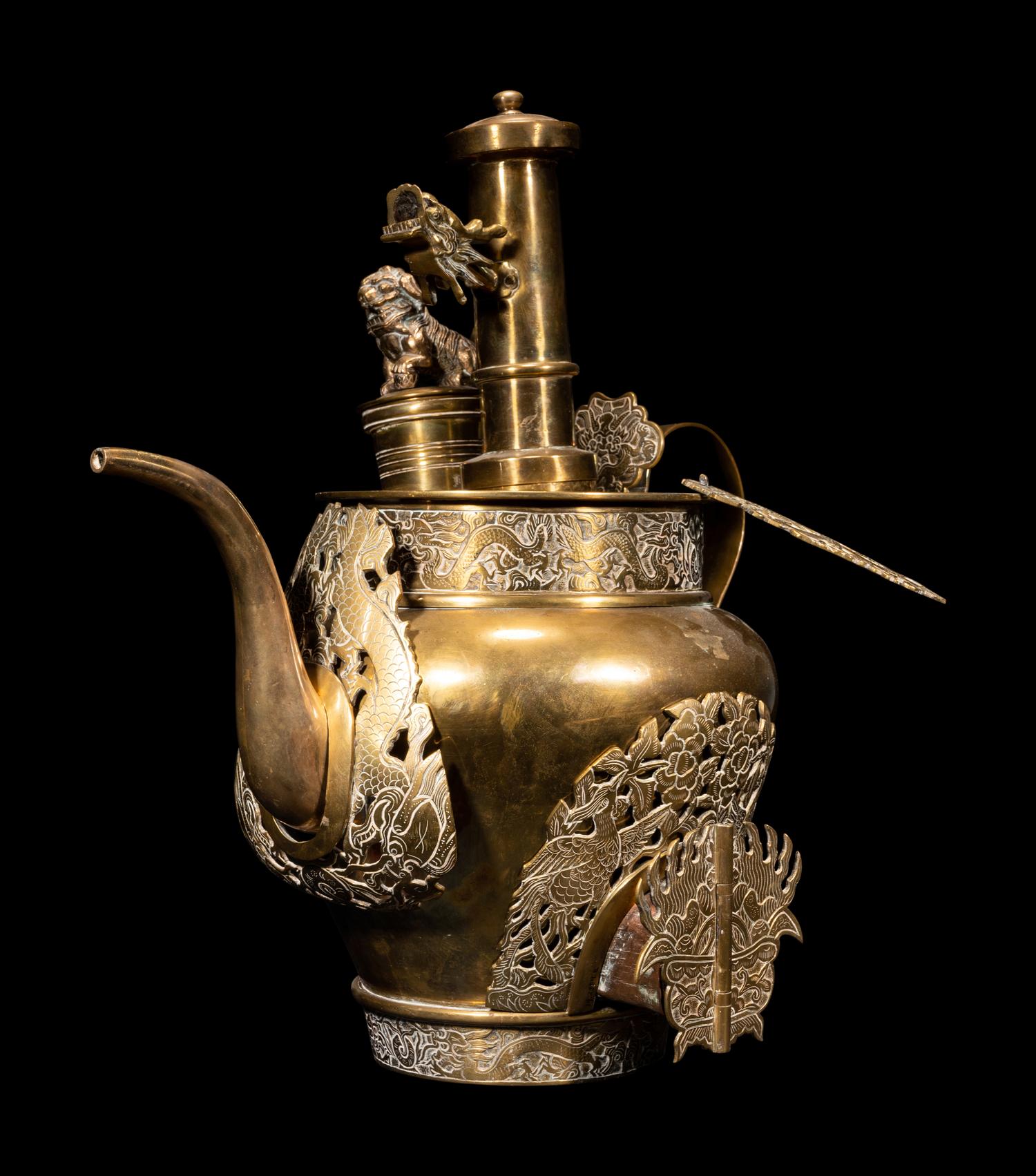A Tibetan Silver and Copper Covered Ewer and A Chinese Bronze Pitcher