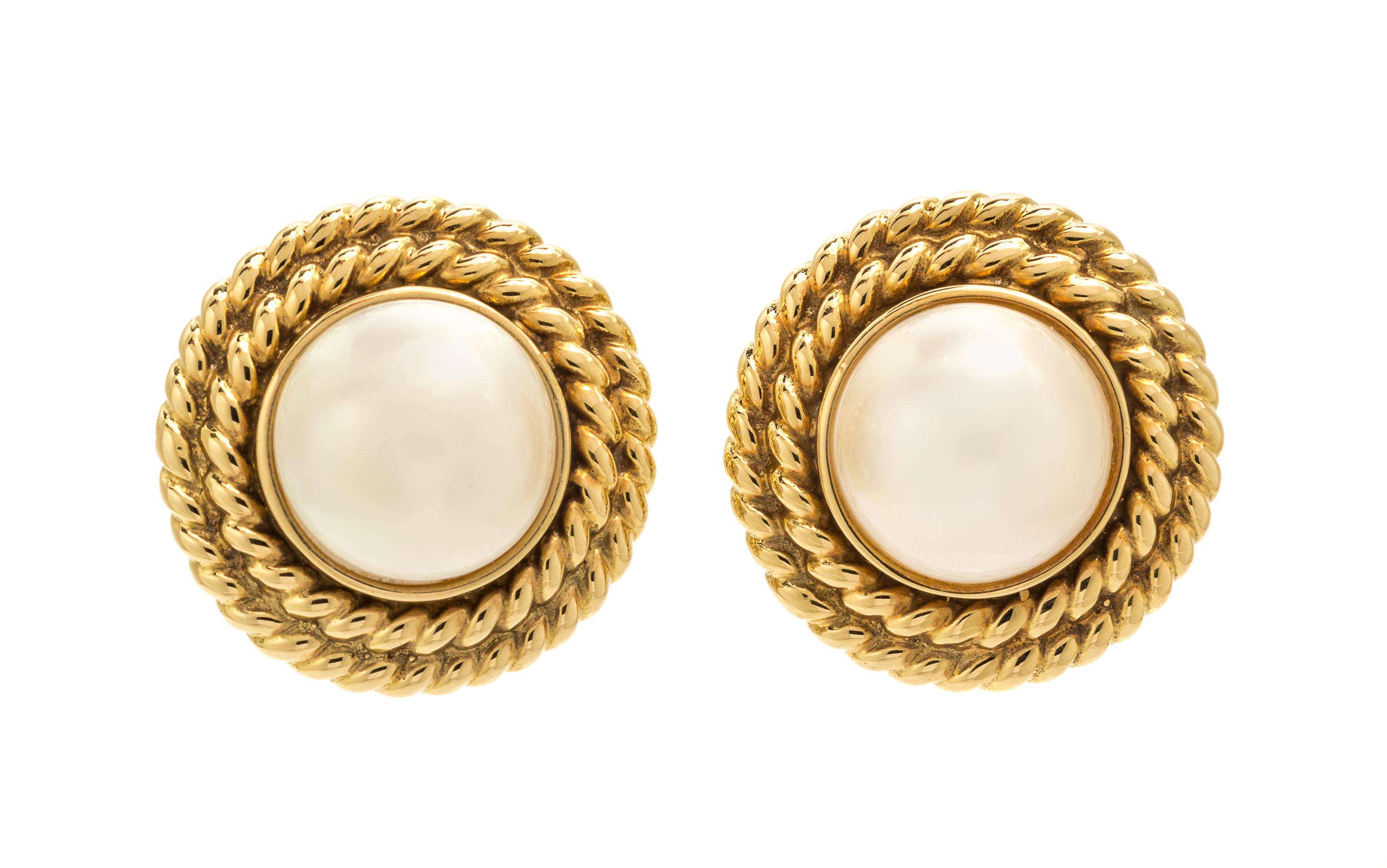 A Pair of 14 Karat Yellow Gold and Cultured Mabe Pearl Earclips, 18.00 dwts.