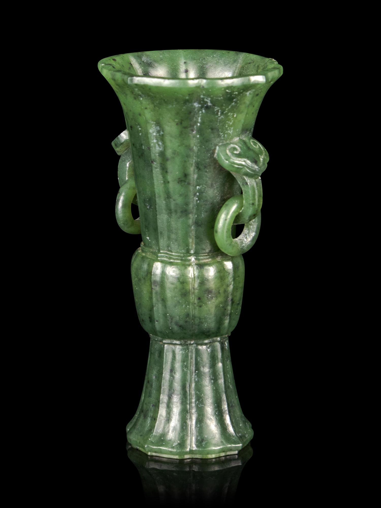 A Carved Spinach Jade Gu Vase
