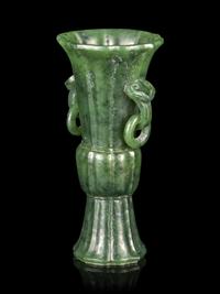 A Carved Spinach Jade Gu Vase