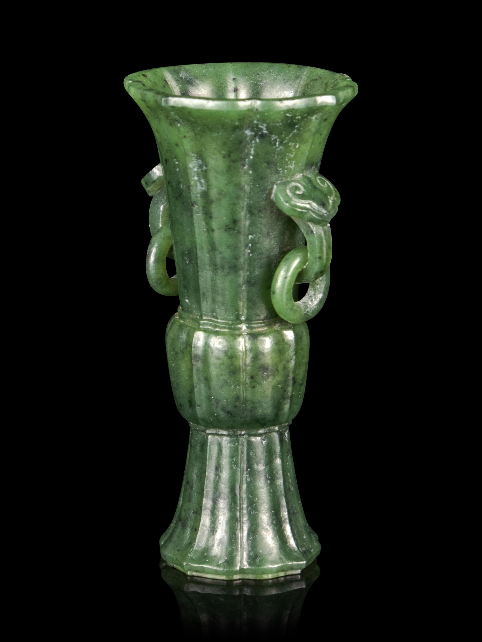 A Carved Spinach Jade Gu Vase