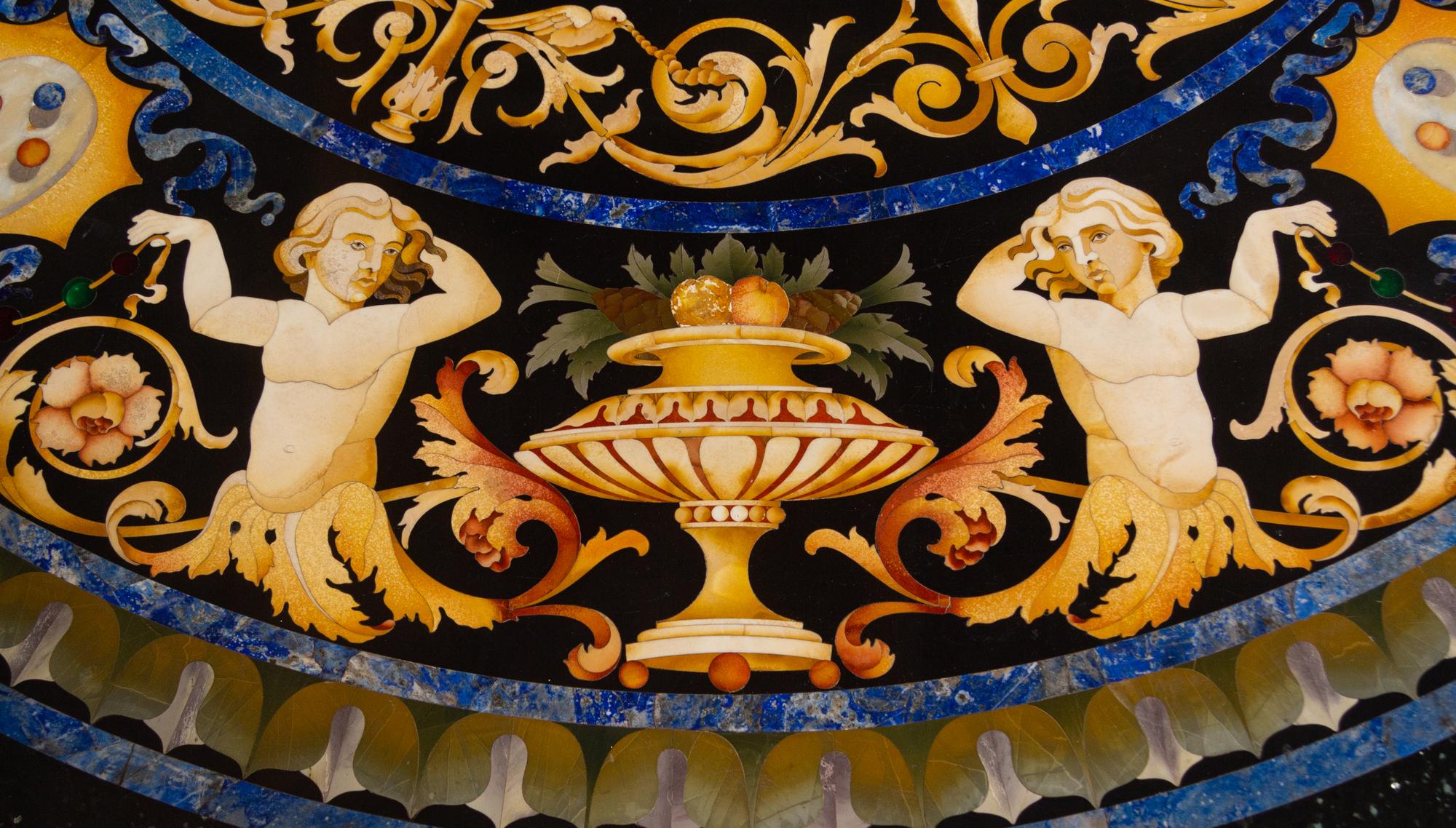 A Regency Style Giltwood Center Table with a Pietra Dura Top
