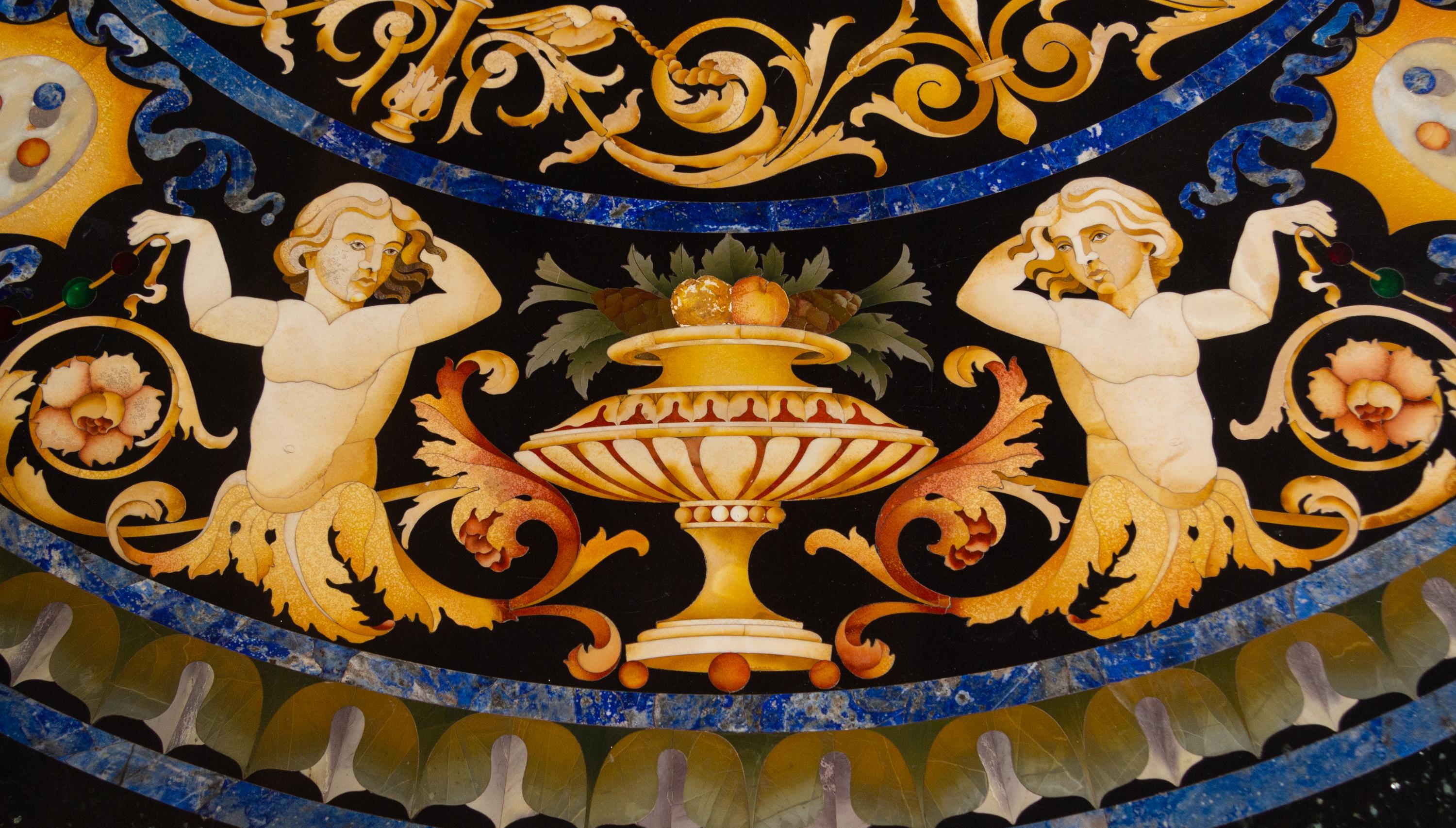 A Regency Style Giltwood Center Table with a Pietra Dura Top