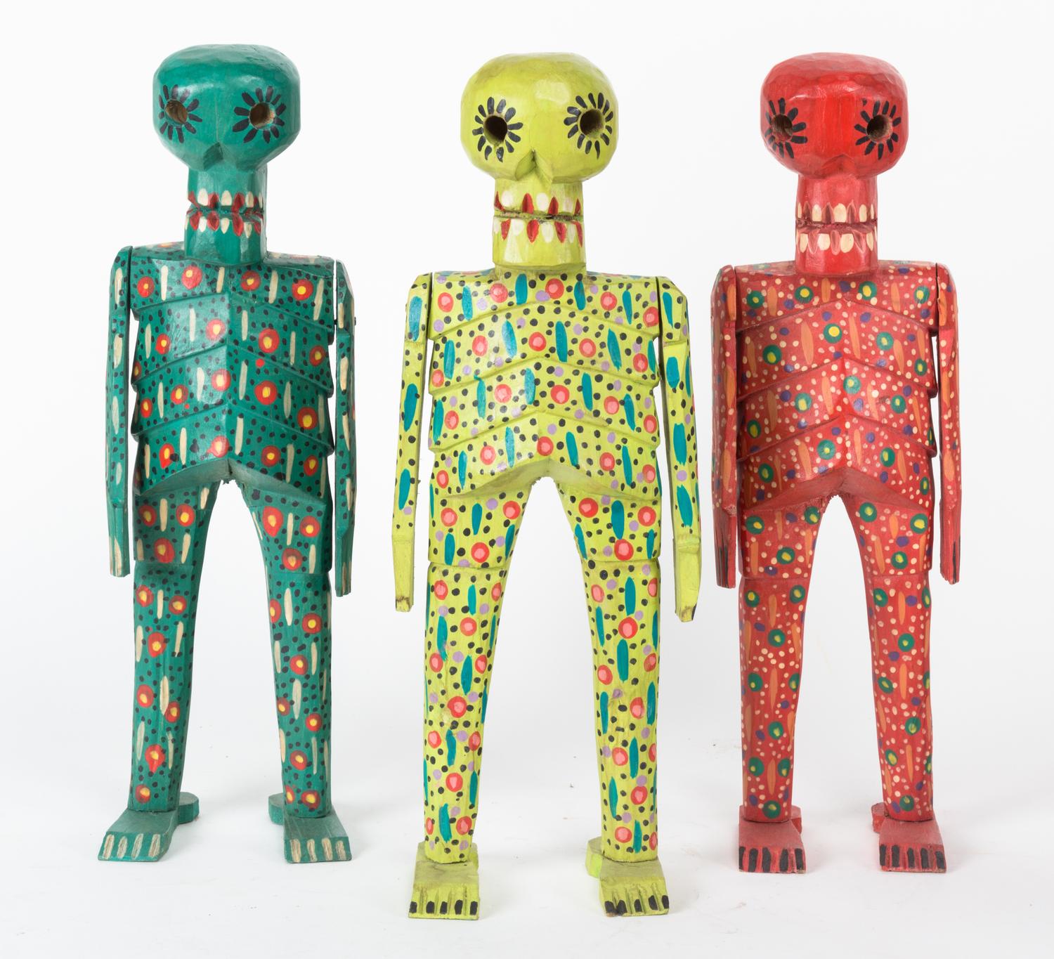A Set of Three Painted and Articulated Mexican Calaca Figures Height 15 inches (each).