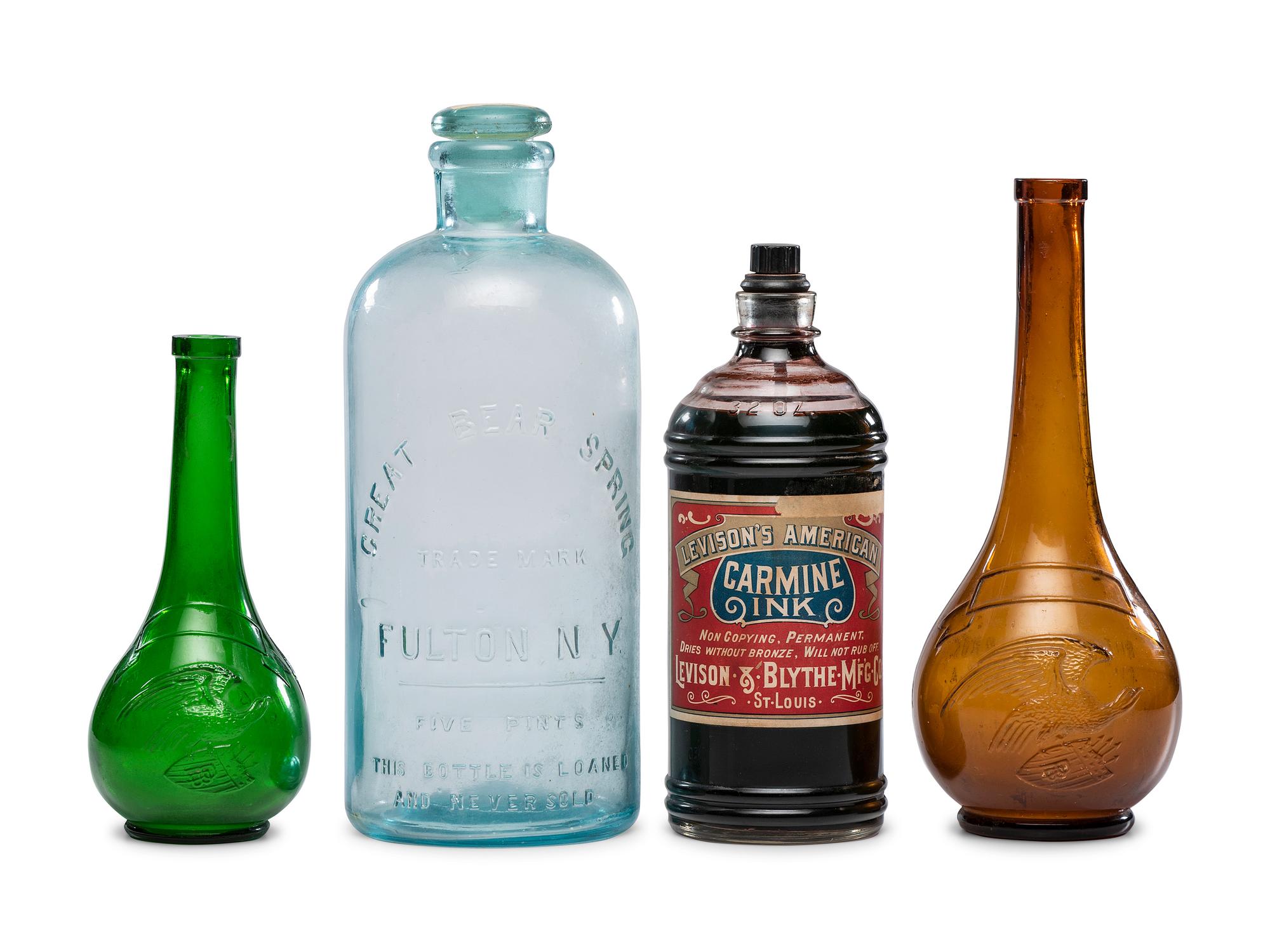 Four Glass Advertising Bottles