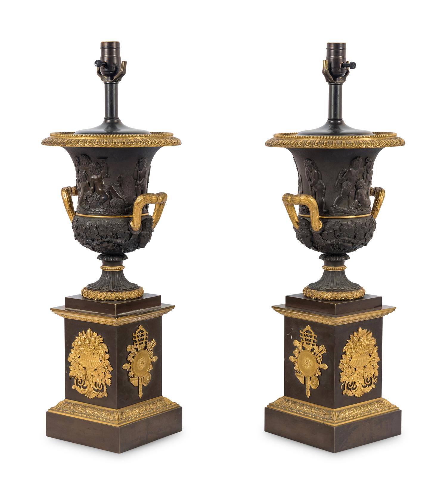 A Pair of Louis Phillippe Parcel-Gilt and Patinated Bronze Urns Mounted as Lamps