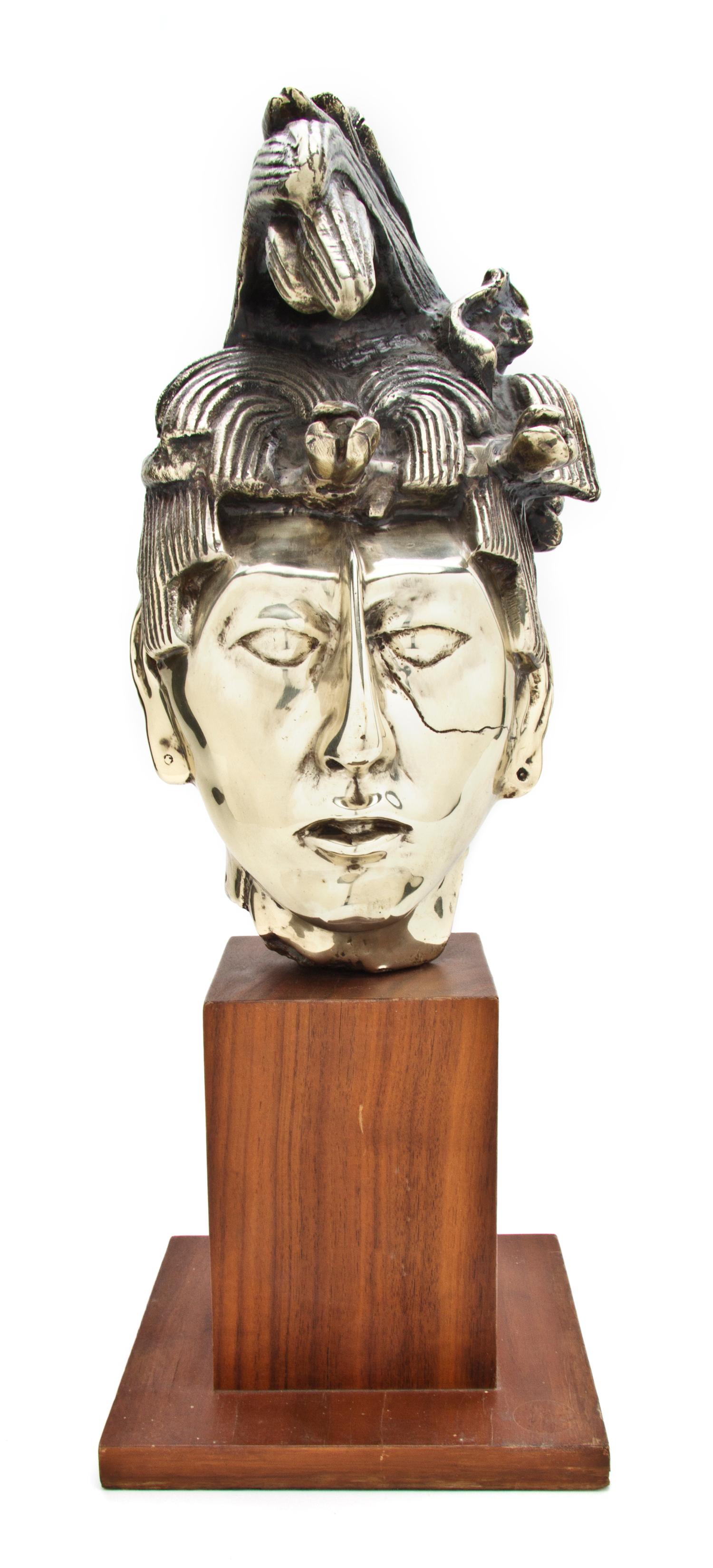 A Silvered Metal Bust, Height 14 1/4 inches.
